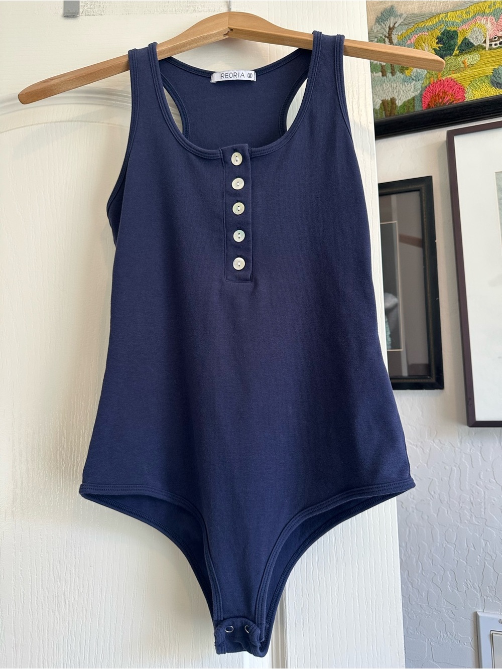 ReoRia Navy Shell Button Bodysuit. Size: Small. Great condition